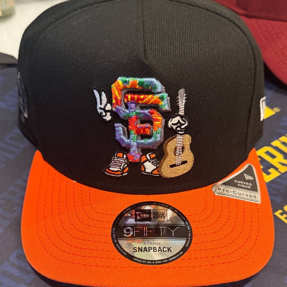 New Era Black and Orange Graphic Snapback Hat